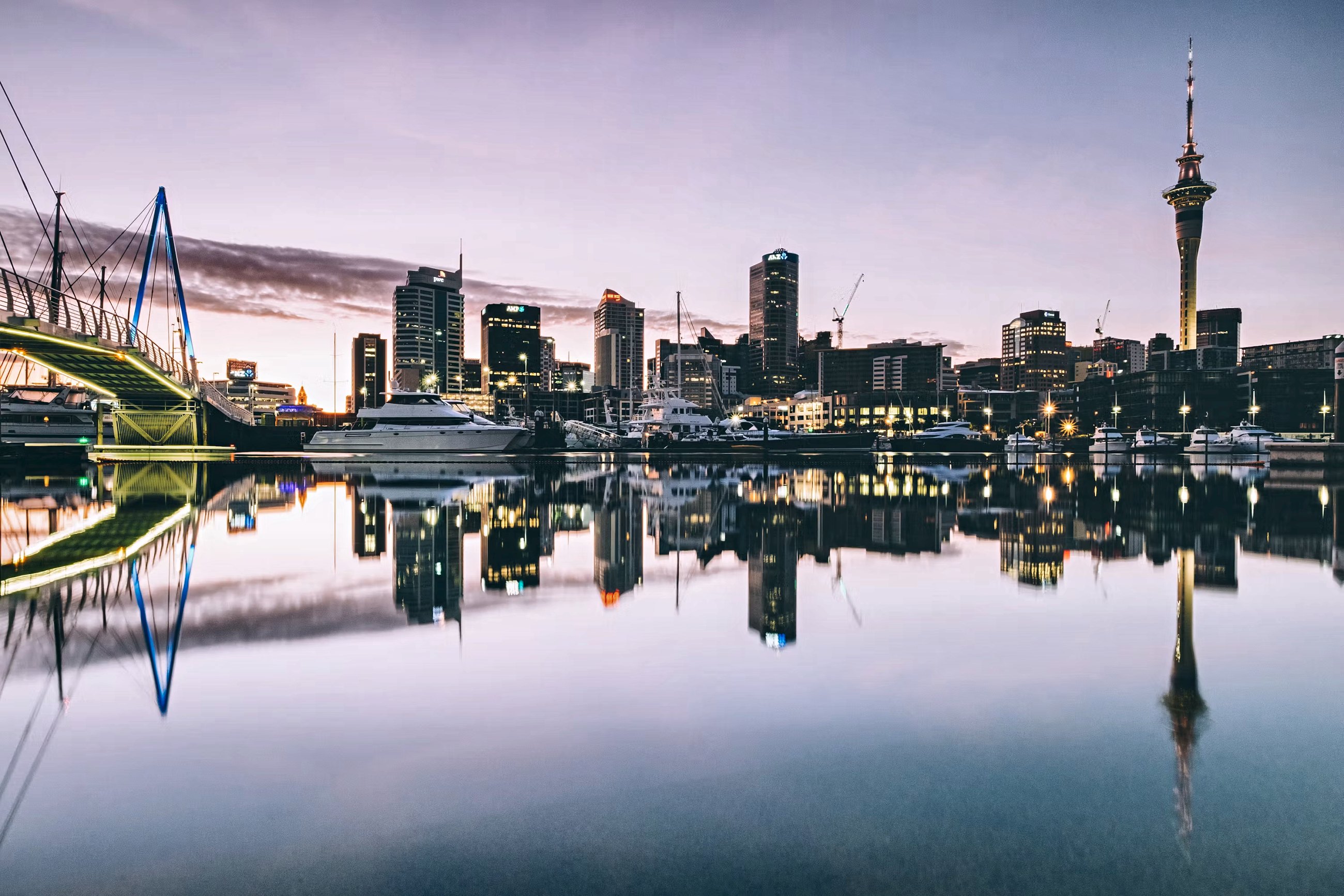 Auckland skyline across the Waitemata Harbour at dusk